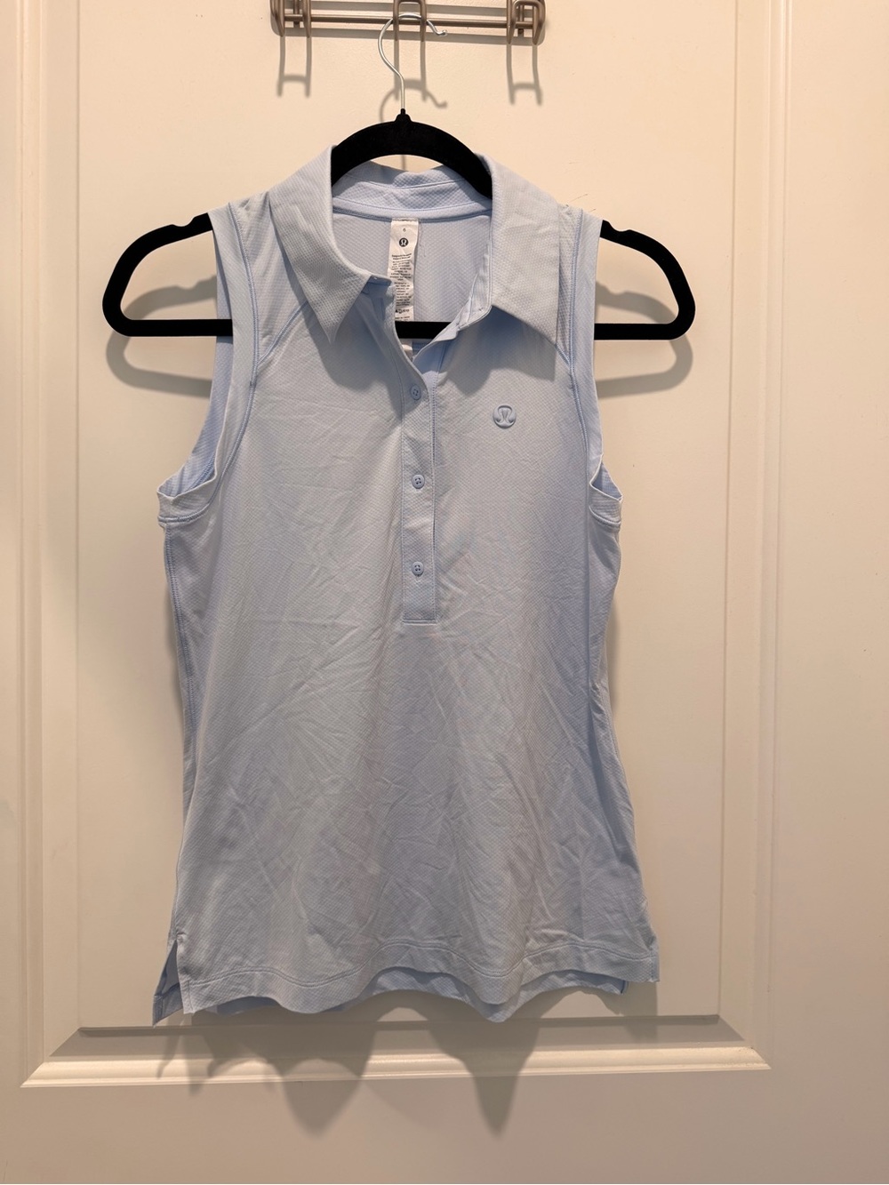 Lululemon Quick-Dry
Sleeveless Polo Shirt Light
Blue Size 6